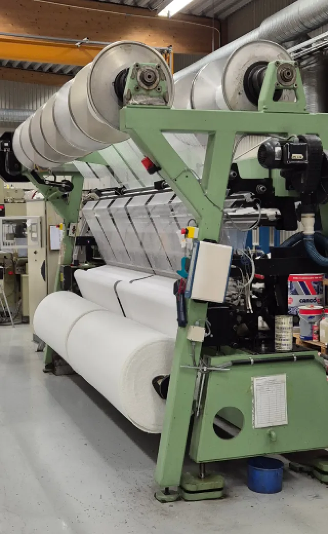 Varptrikåmaskin i fabriken i Lidköping